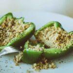 Vegetarian Stuffed Peppers served on white plate.