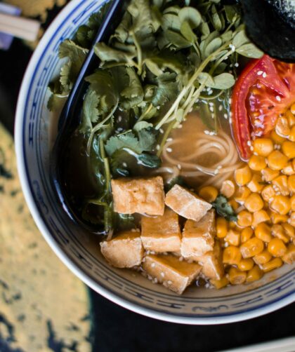 Corn Soup served in a bowl with some vegetables