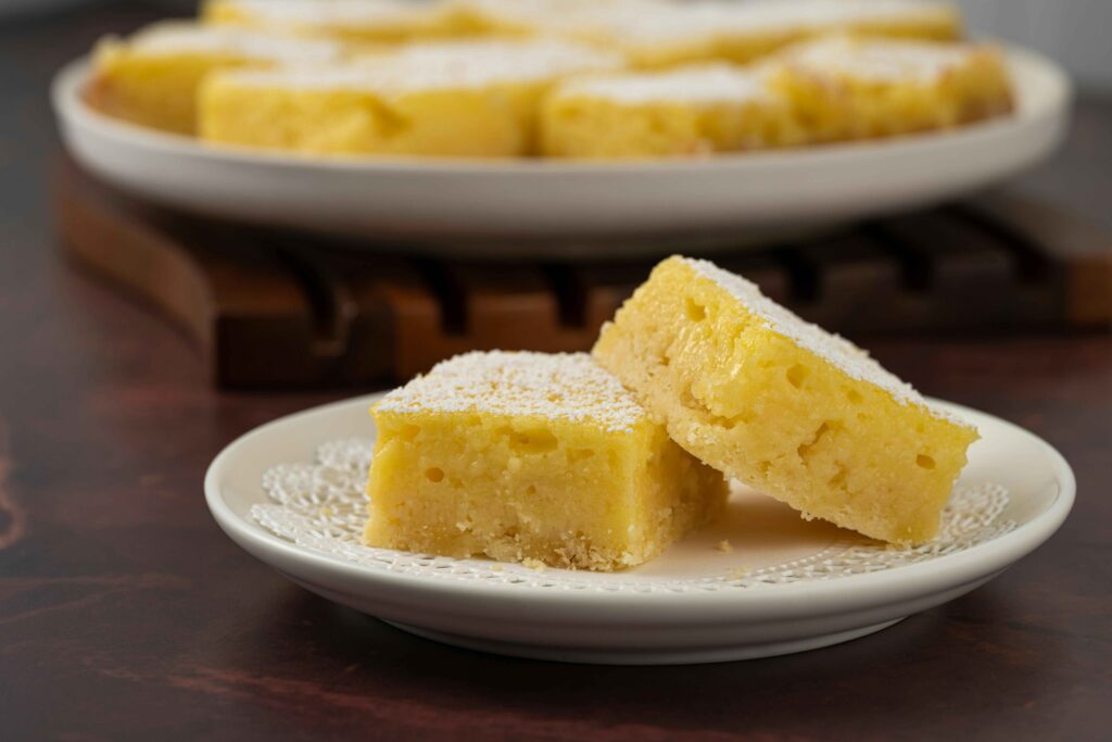 Two Dhokla served on a white plate