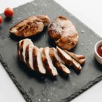 Baked Chicken Breast served in a black tray