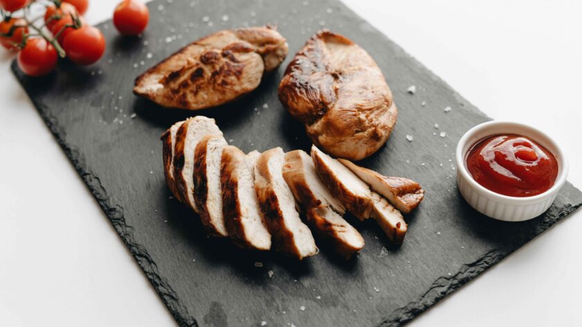 Baked Chicken Breast served in a black tray