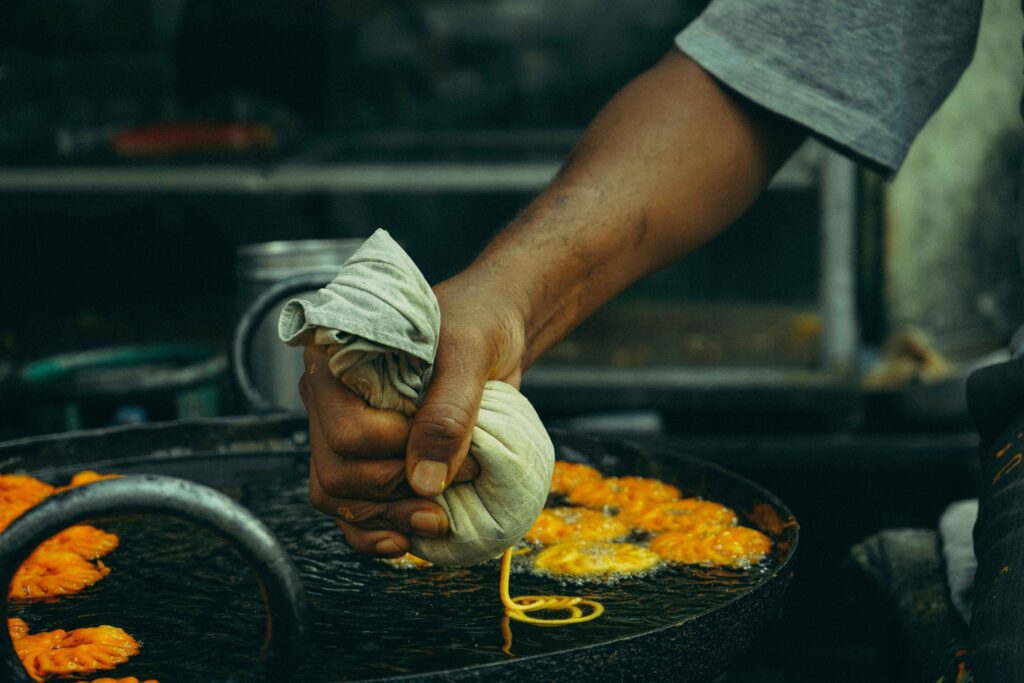 Person is making jalebi