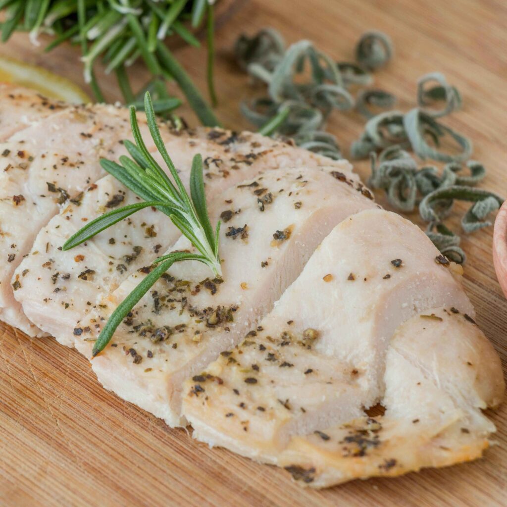 Baked Chicken Breast served on wooden tray