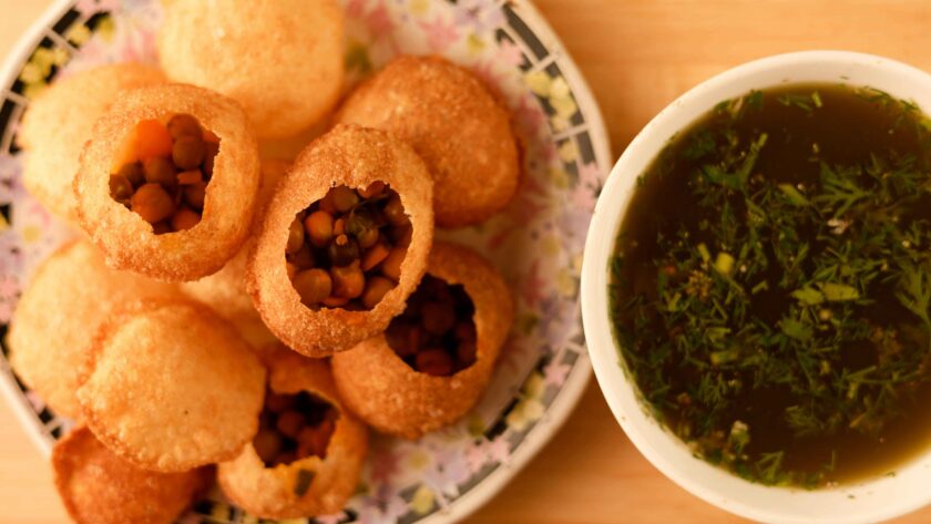 Pani puri served in plate and Pani puri water served in a Bowl