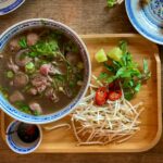 Vegetable Beef Soup served on a wooden Tray