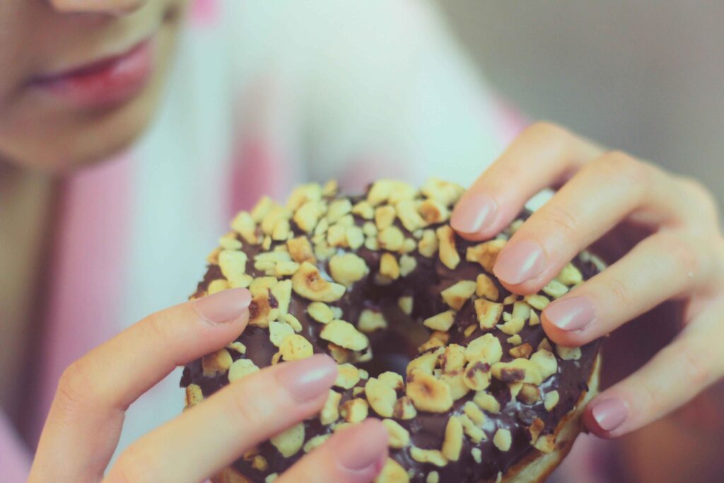 Girl eating Donut