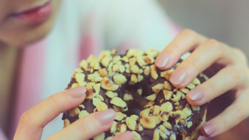 Girl eating Donut