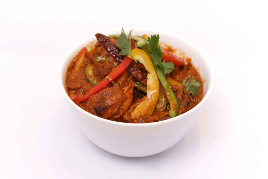 Mango Chicken Curry served in a bowl.