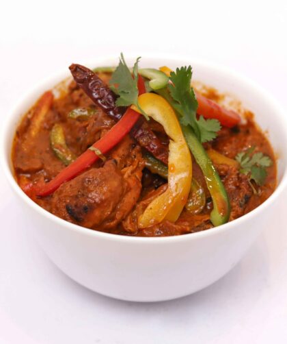 Mango Chicken Curry served in a bowl.