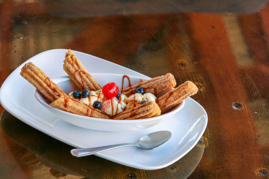 Churros Recipe served in a white tray