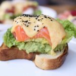 Mini Salmon Club sandwich served on a white plate