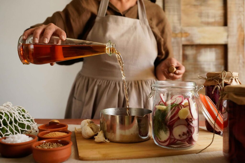 A woman is preparing onion pickle 