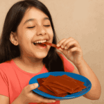 Aam Papad is eaten by a girl