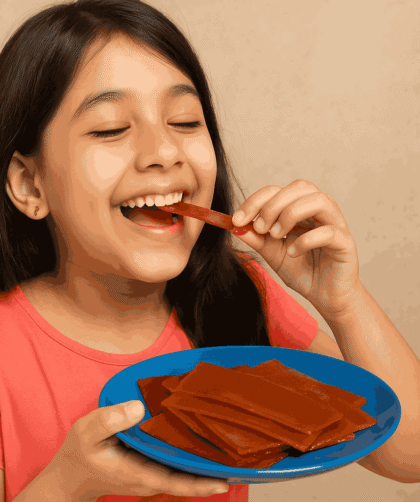 Aam Papad is eaten by a girl