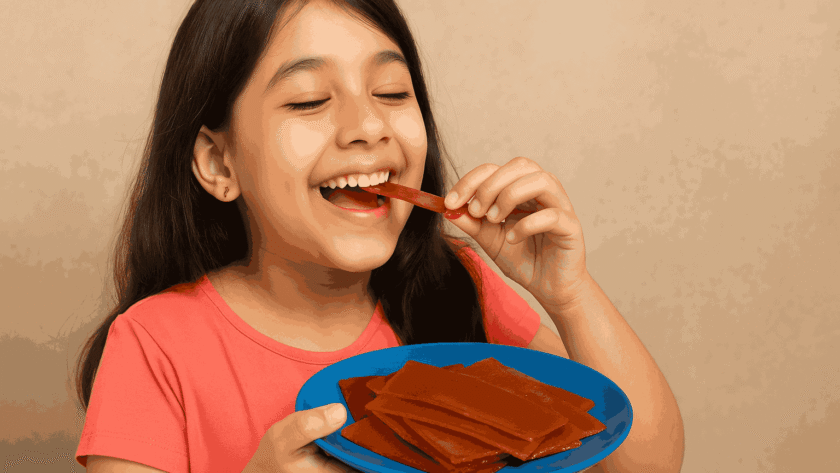 Aam Papad is eaten by a girl