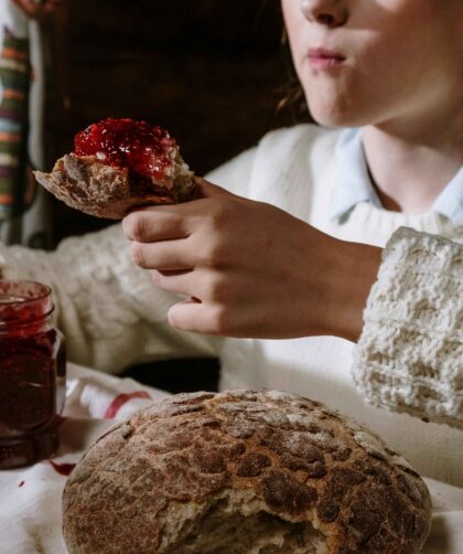 A girl is eating Watermelon Jam