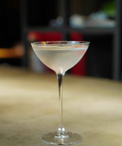 Lychee Martini is served in a glass