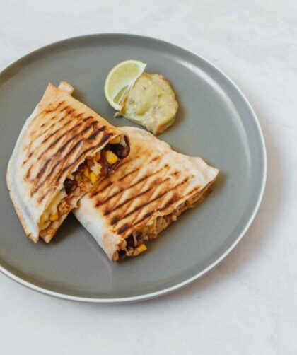 Cheese corn sandwich served on a grey plate