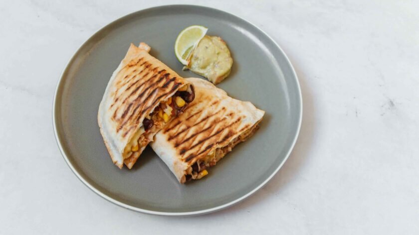 Cheese corn sandwich served on a grey plate